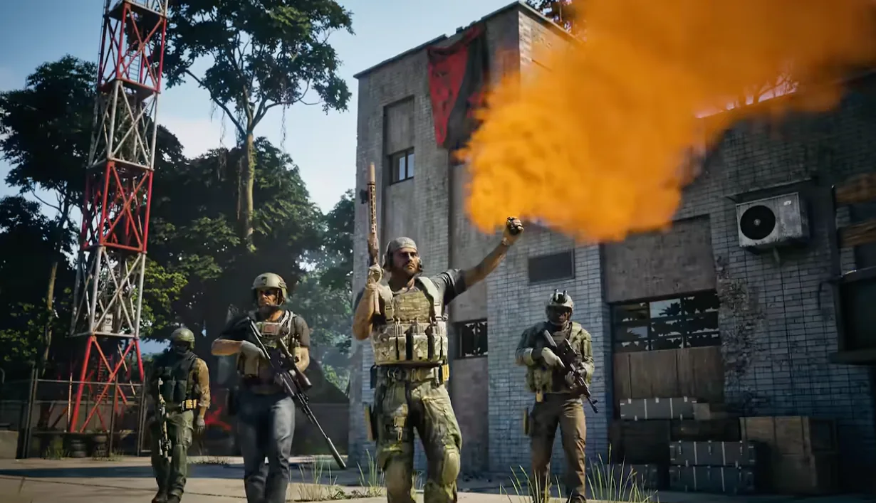 WARDOGS squad moving beside an orange smoke marker